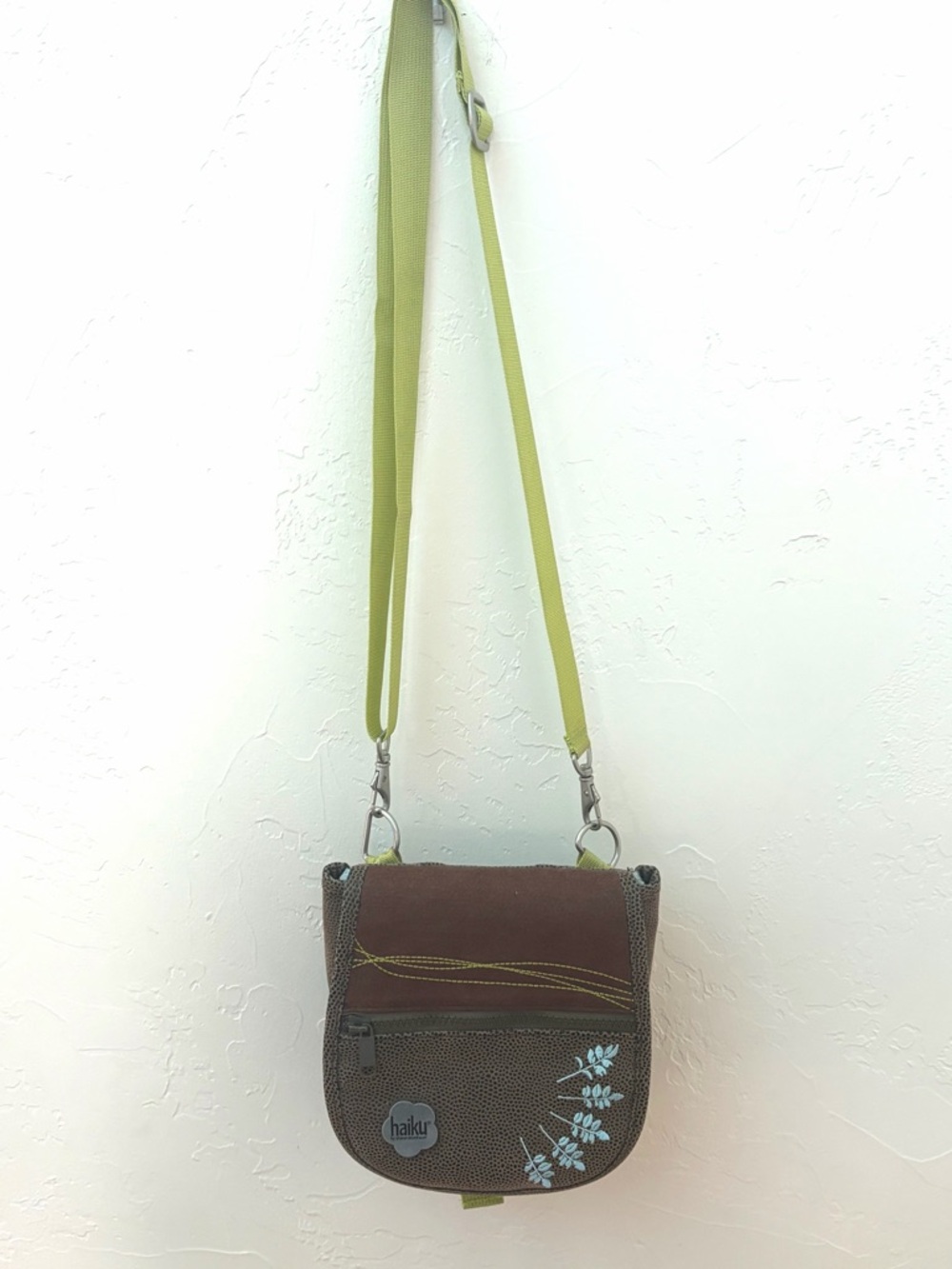 Haiku Brown Crossbody with Lime Green Strap and Blue Floral Detail